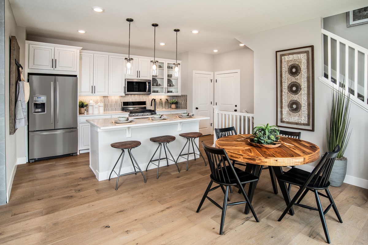 New Homes in Erie, CO - Flatiron Meadows Villas Plan 1671 Dining Room & Kitchen