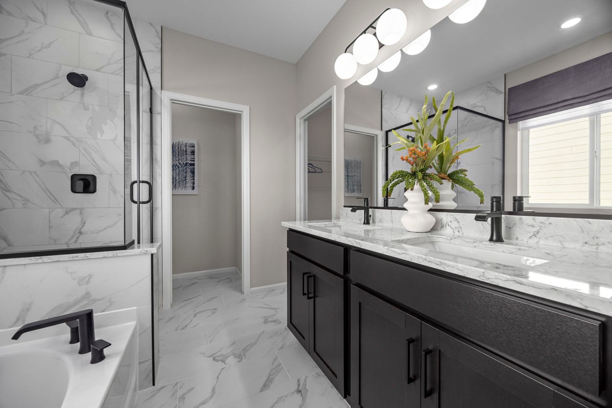Dual-sink vanity at primary bathroom