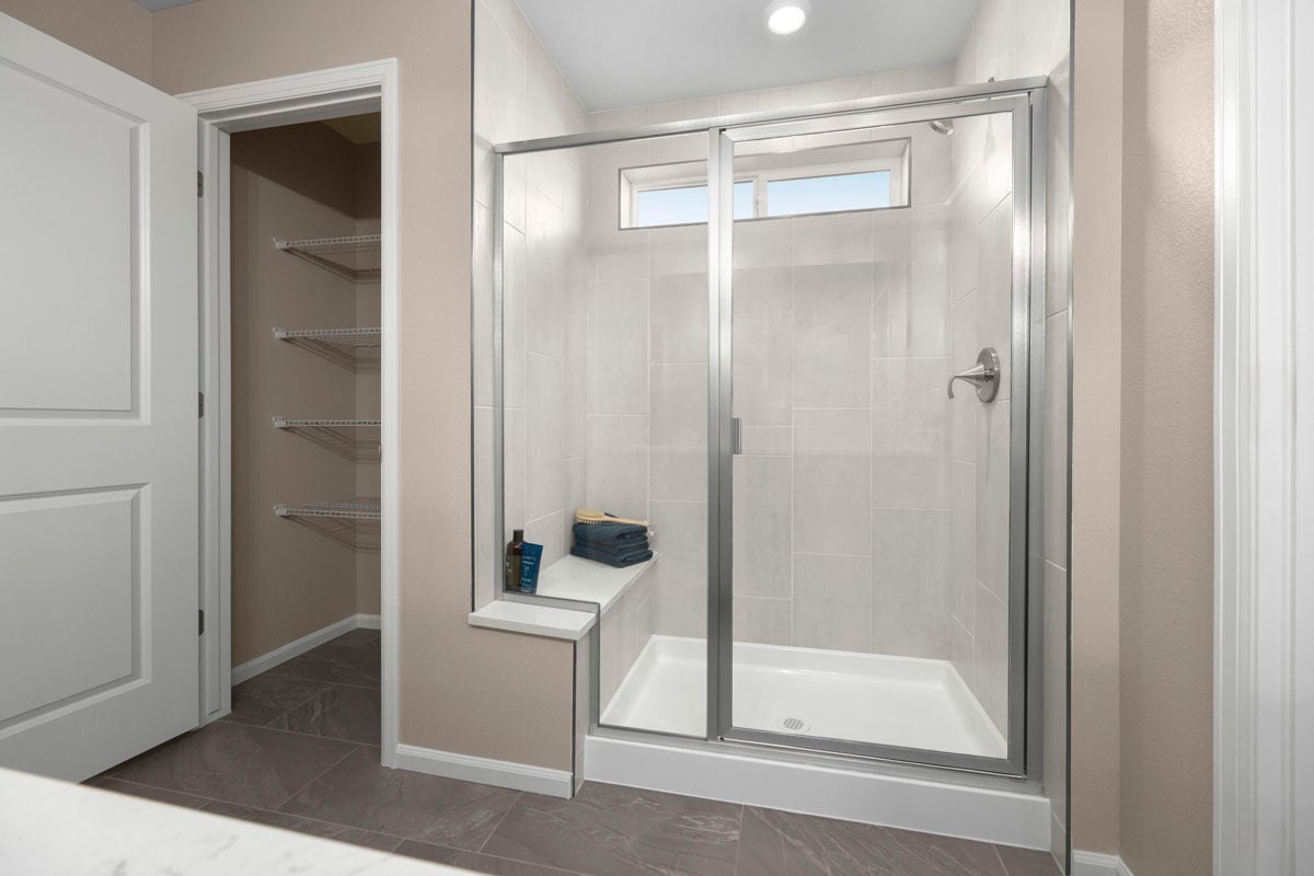 Walk-in shower at primary bath