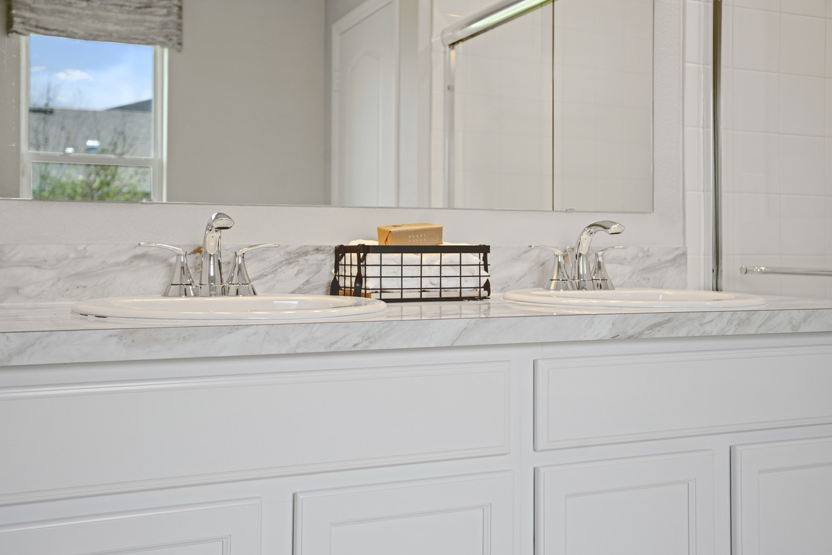 Dual-sink vanity at primary bath