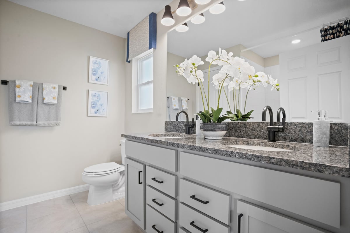 Dual-sink vanity at primary bath