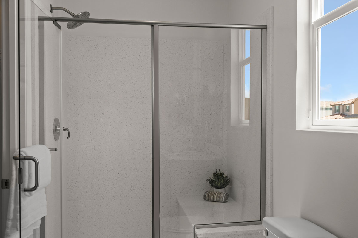Enlarged shower with seat