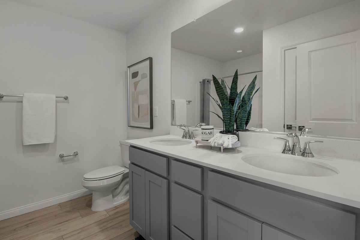 Dual-sink vanity with upgraded quartz countertop 