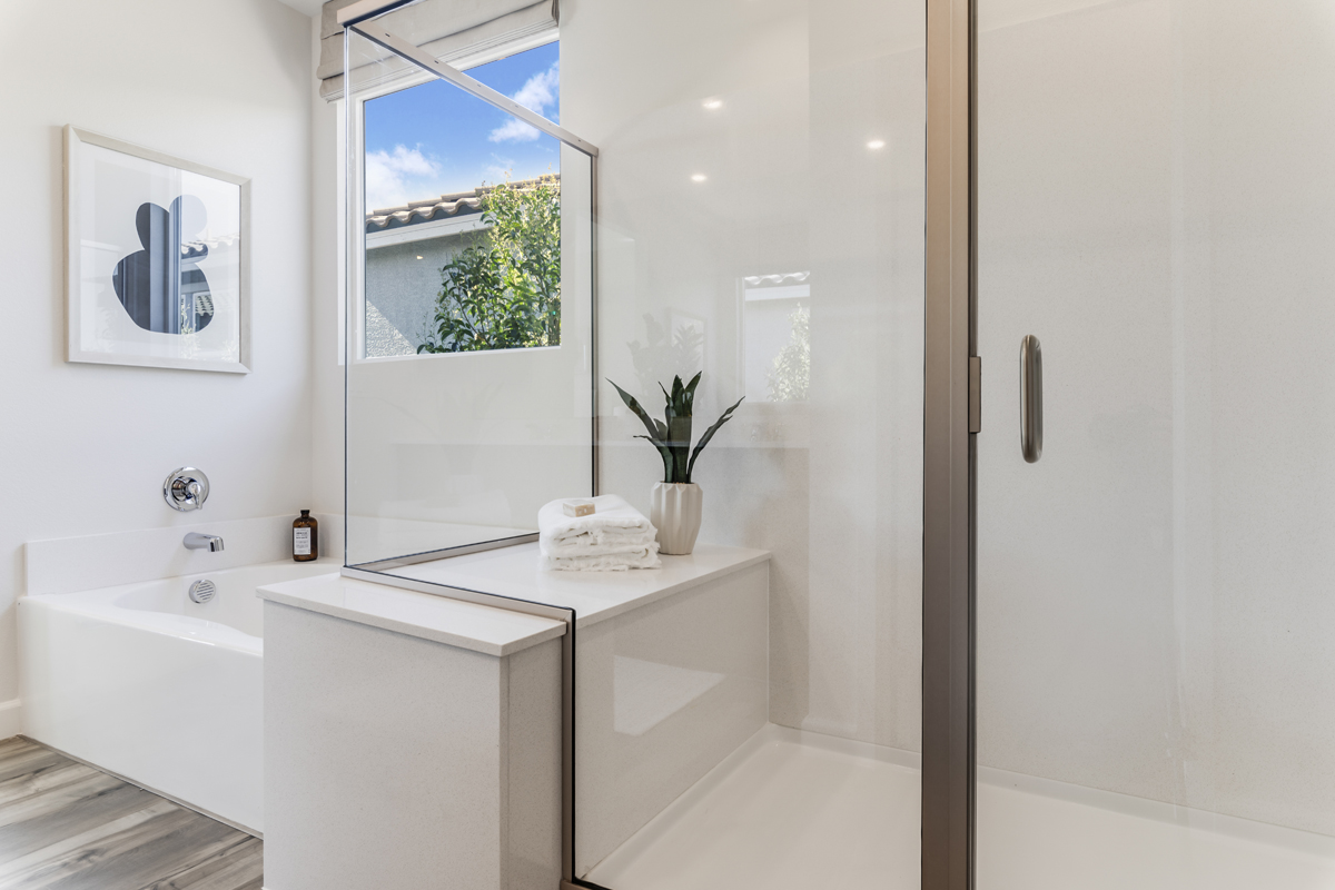 Tub and separate shower with seat at primary bath