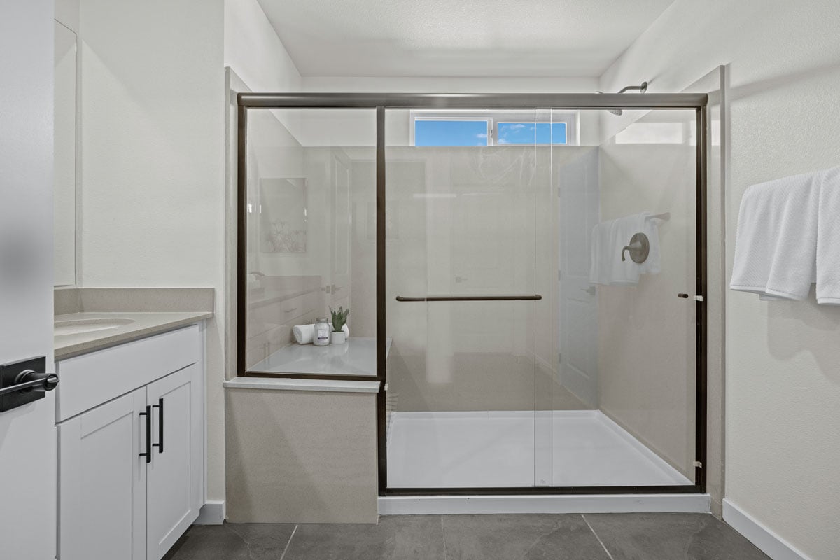 Enlarged shower with seat