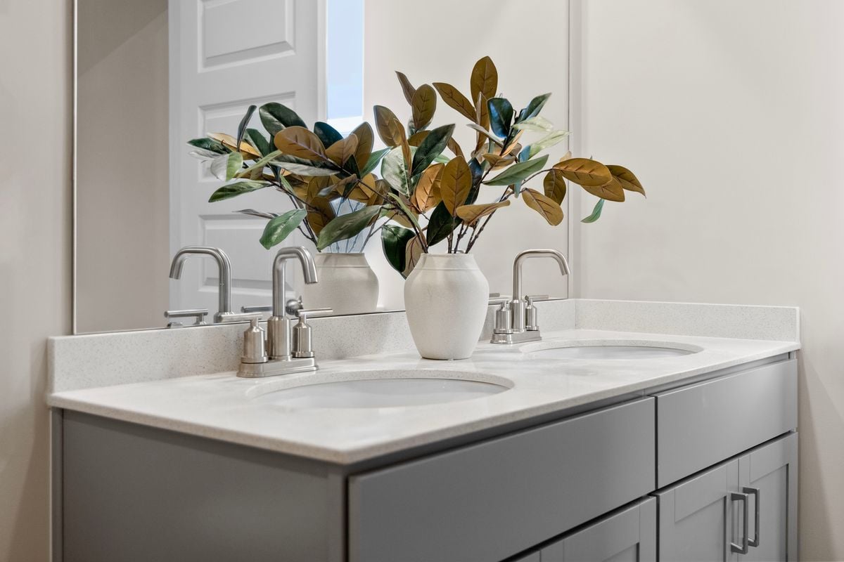Dual-sink vanity at primary bath