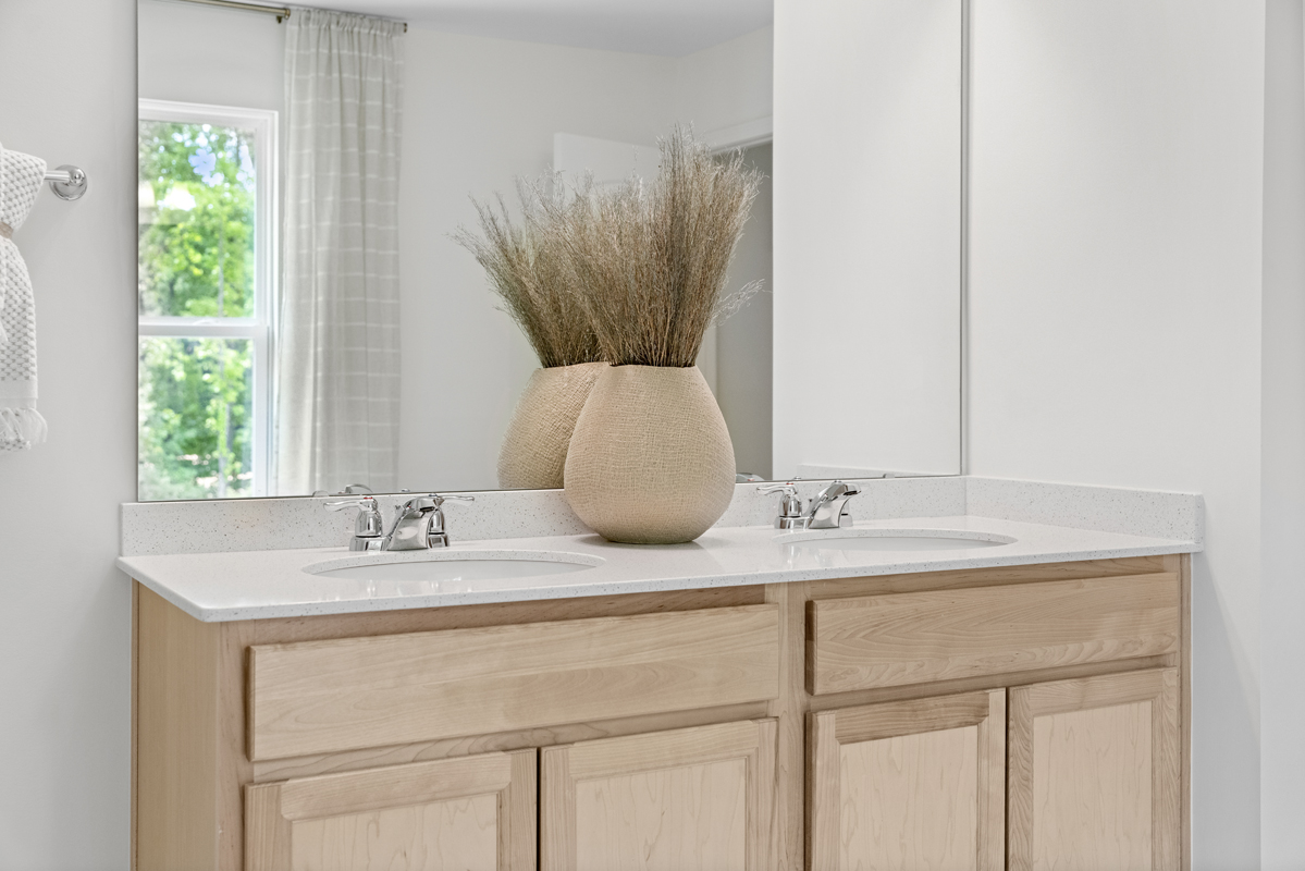 Dual-sink vanity at primary bath