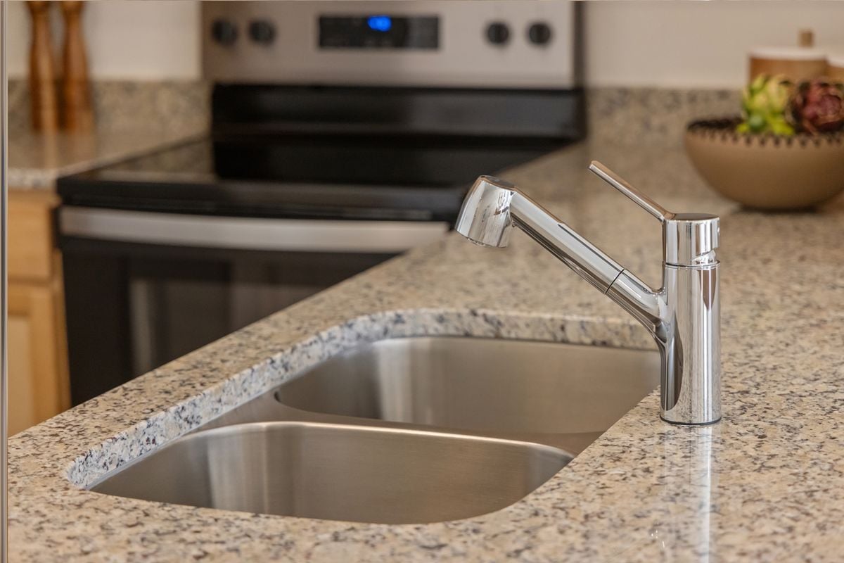 Double-basin kitchen sink