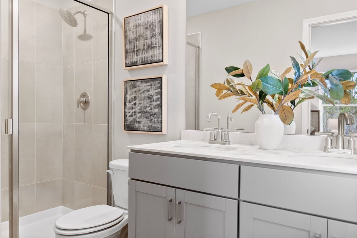 Dual-sink vanity at primary bath