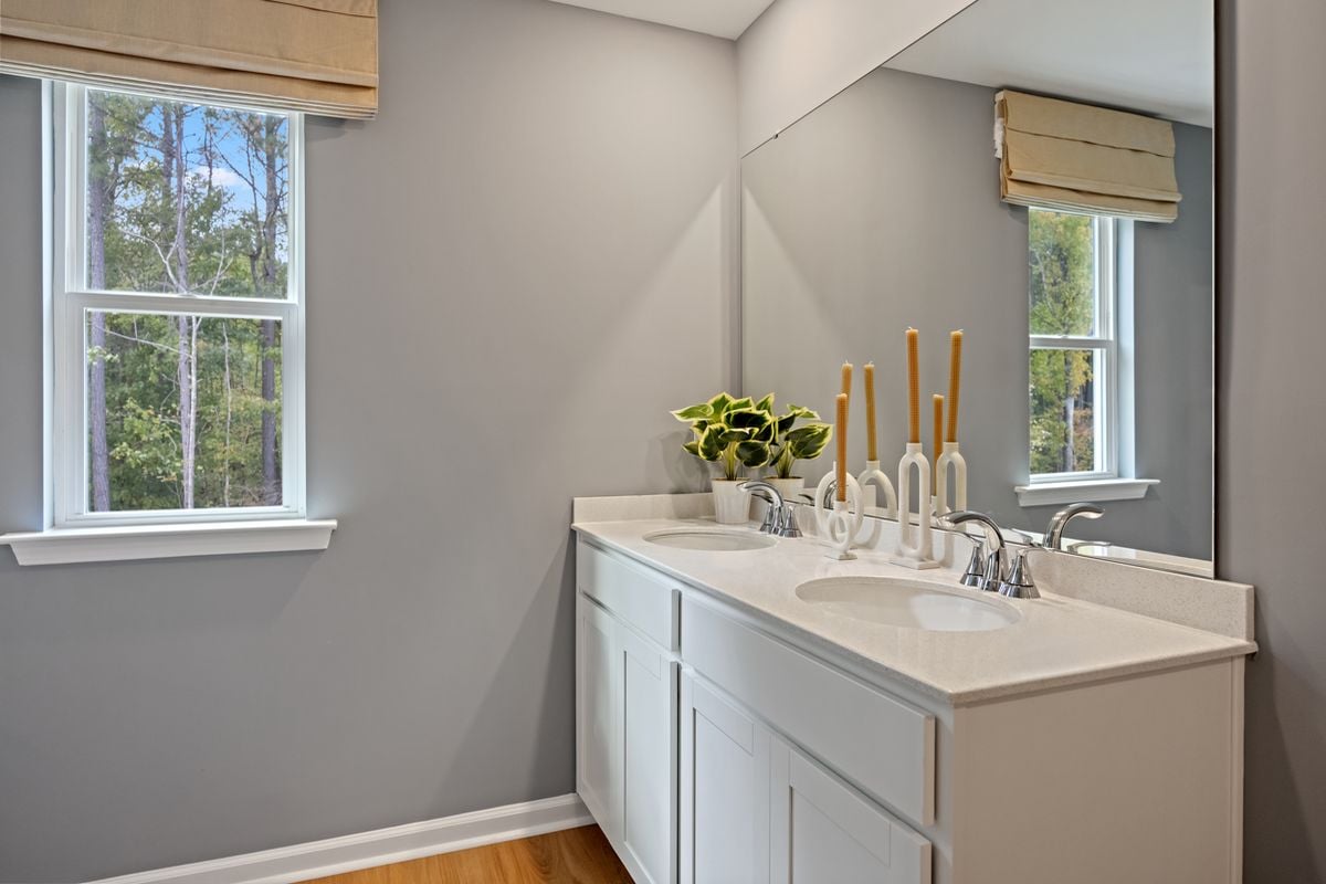 Dual-sink vanity at primary bath