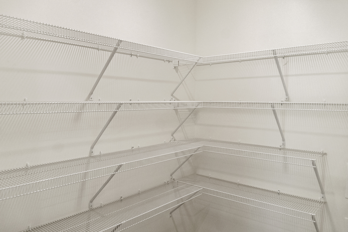 Walk-in closet at primary suite