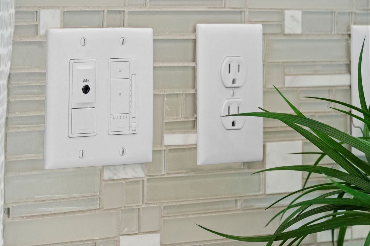 Low voltage volume control and outlet