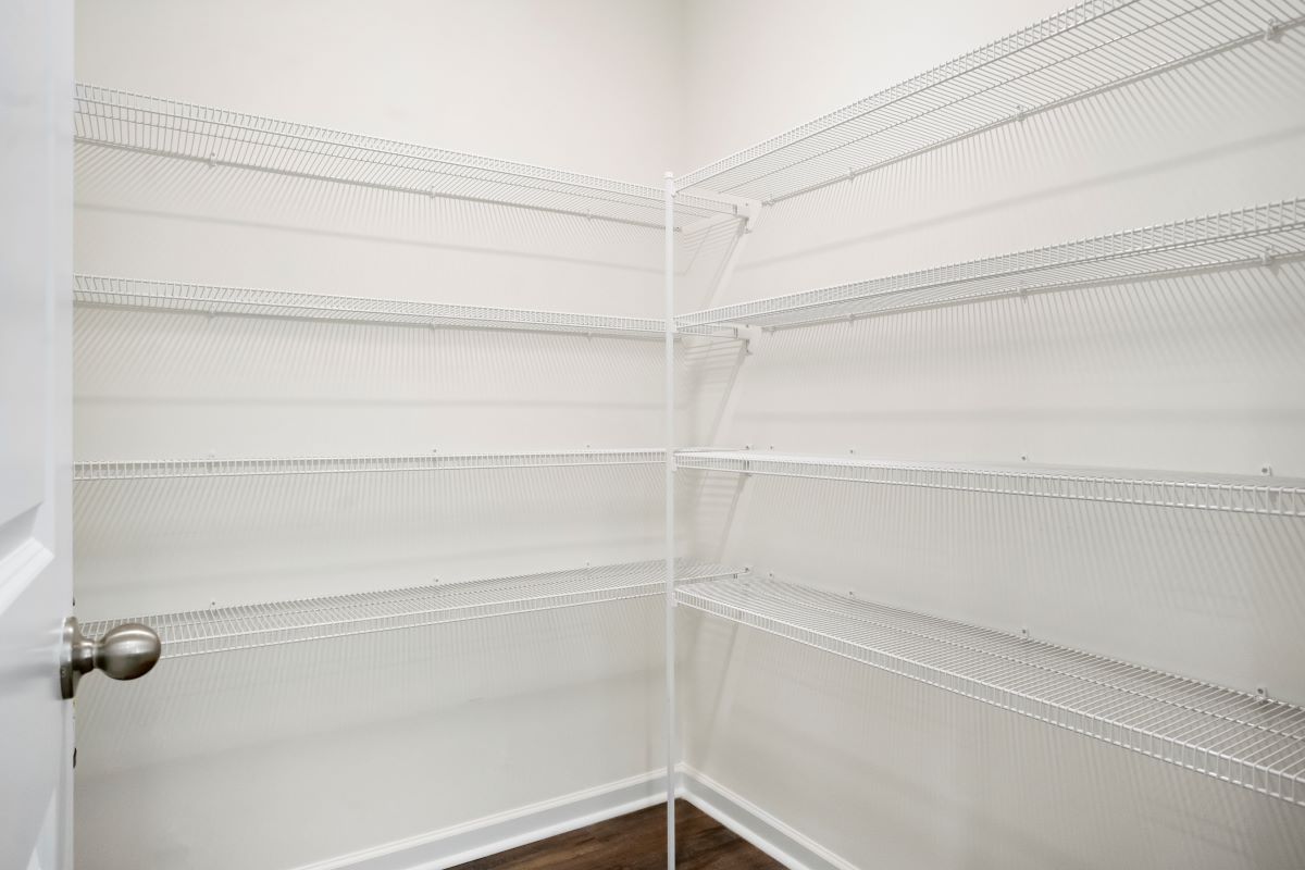 Walk-in closet at primary suite