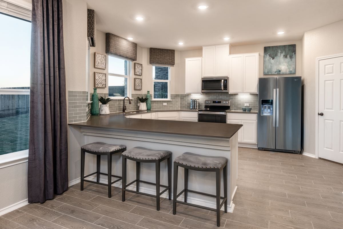 New Homes in Pflugerville, TX - Village at Northtown Plan 2070 Kitchen