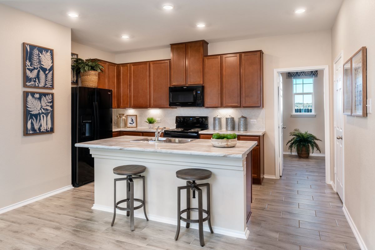 New Homes in Belton, TX - West Canyon Trails Plan 1491 Kitchen as modeled at Haven Oaks
