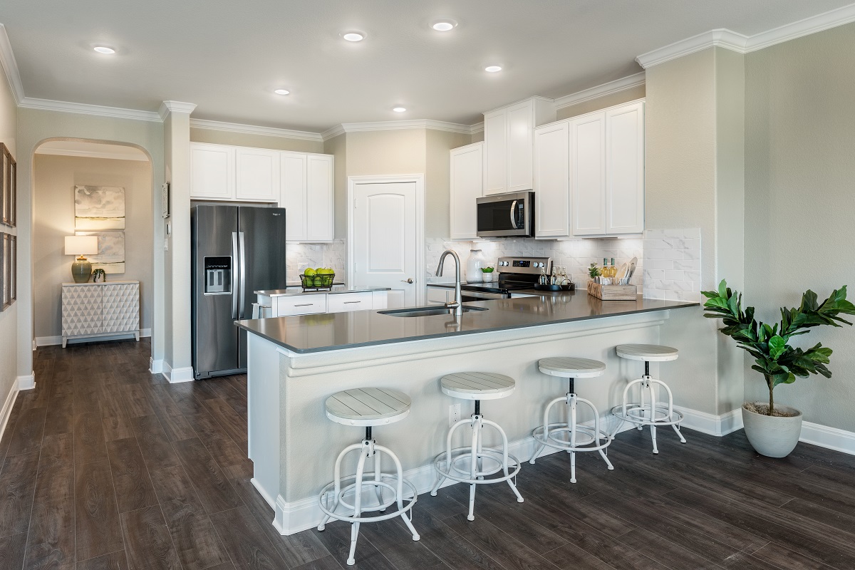 New Homes in Georgetown, TX - Berry Springs Plan 2458 Kitchen as modeled at Maple Creek