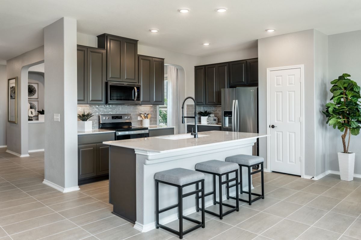 New Homes in Belton, TX - West Canyon Trails Plan 2502 Kitchen as modeled at McKinney Crossing