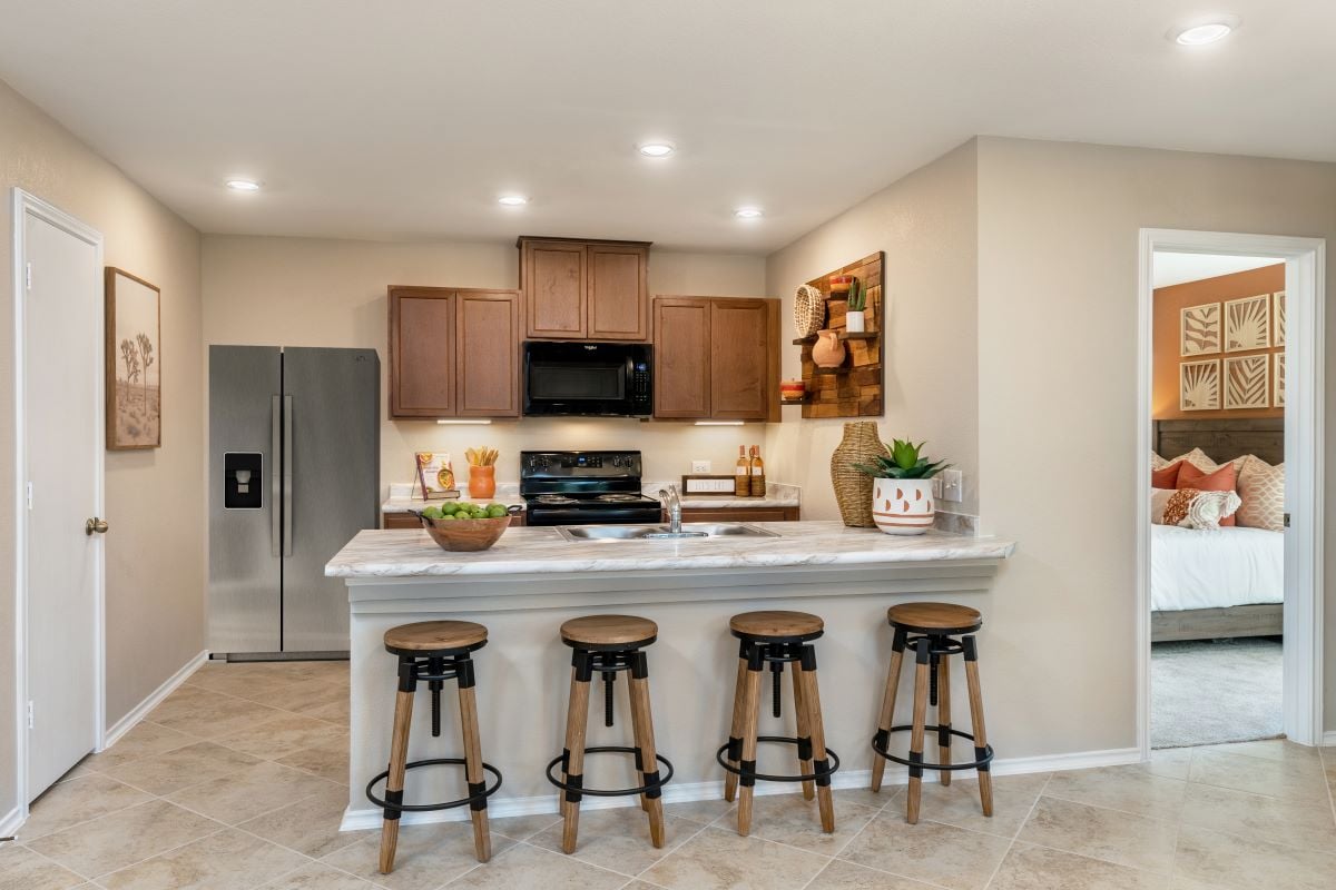 New Homes in Georgetown, TX - Maple Creek Plan 1360 Kitchen as modeled at Sonterra