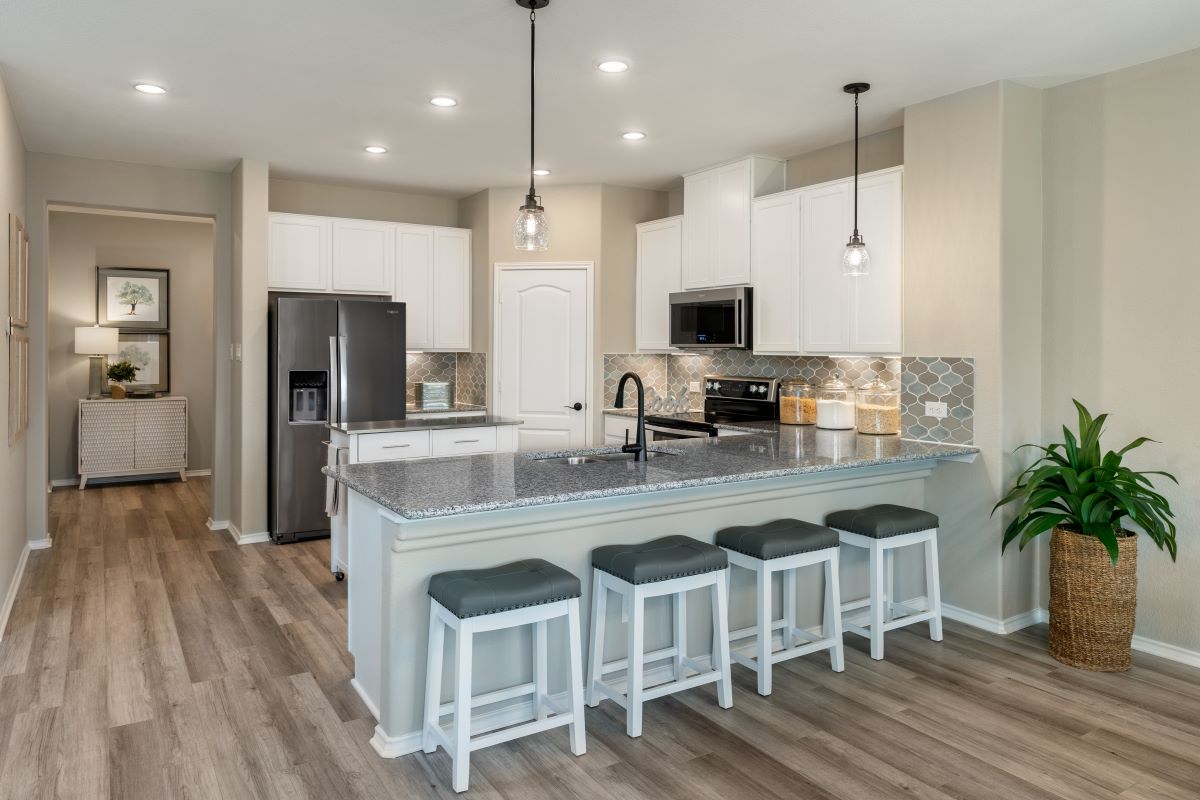 New Homes in Jarrell, TX - Sonterra - Cool Water Plan 2458 Kitchen