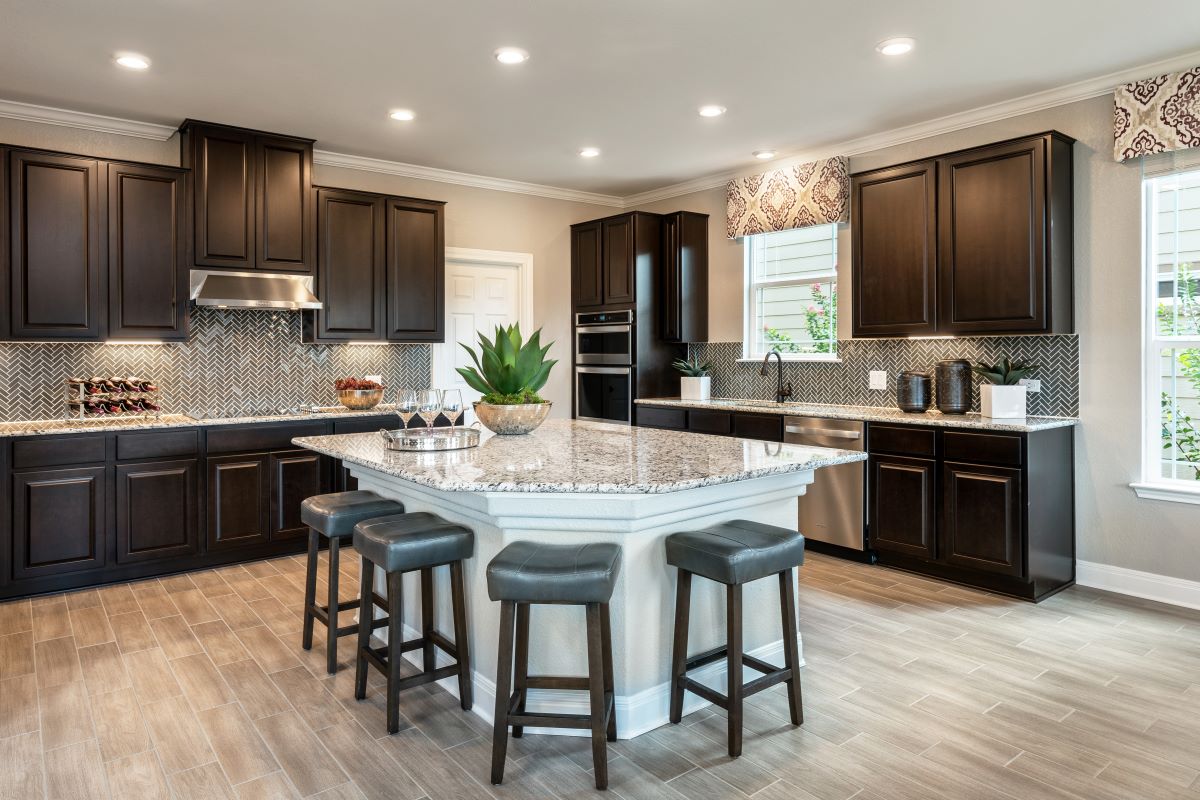 New Homes in Belton, TX - West Canyon Trails Plan 2898 Kitchen as modeled at Sonterra