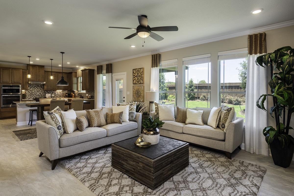 New Homes in Austin, TX - McKinney Crossing Plan 2655 Great Room as modeled at Stagecoach Crossing