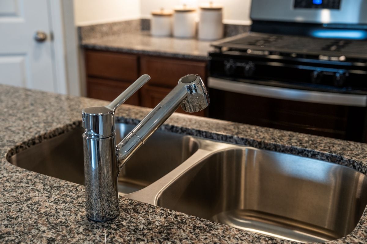 Dual-basin kitchen sink