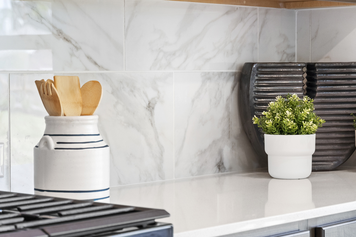 Tile backsplash at kitchen