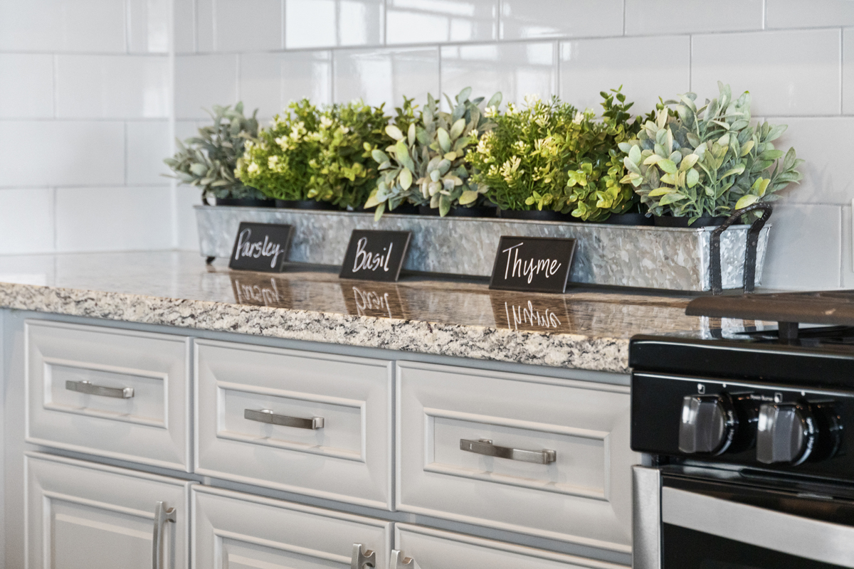 Granite kitchen countertops and tile backsplash