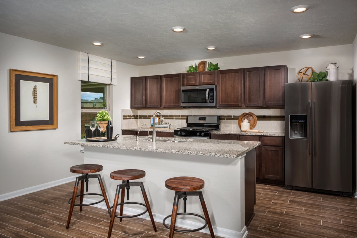 New Homes in Rosharon, TX - Glendale Lakes Plan 2372 Kitchen as modeled at Cypress Creek Landing