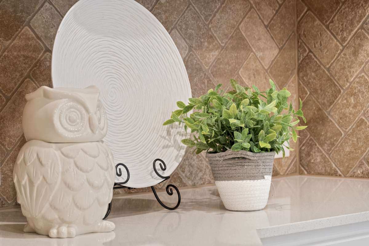 Tile backsplash at kitchen