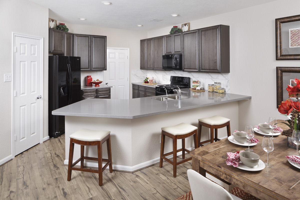 New Homes in Houston, TX - Lakewood Pines Trails Plan 1864 Kitchen as modeled at Katy Manor Trails 