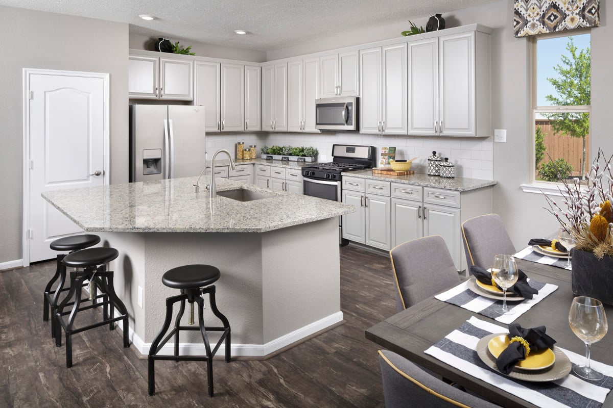 New Homes in Katy, TX - Enclave at Bear Creek Plan 2646 Kitchen as modeled at Katy Manor Trails