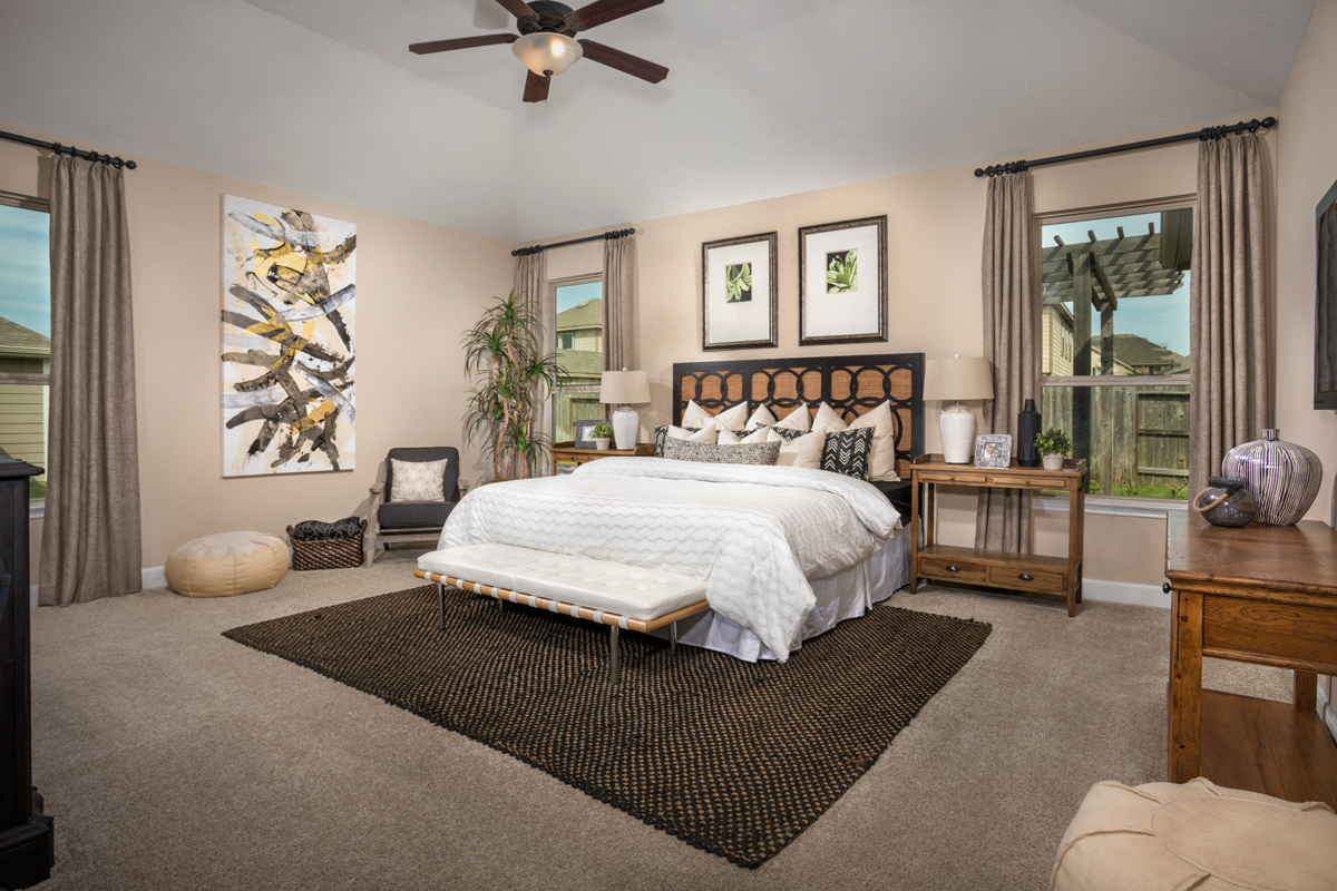 KB model home primary bedroom in Conroe, TX