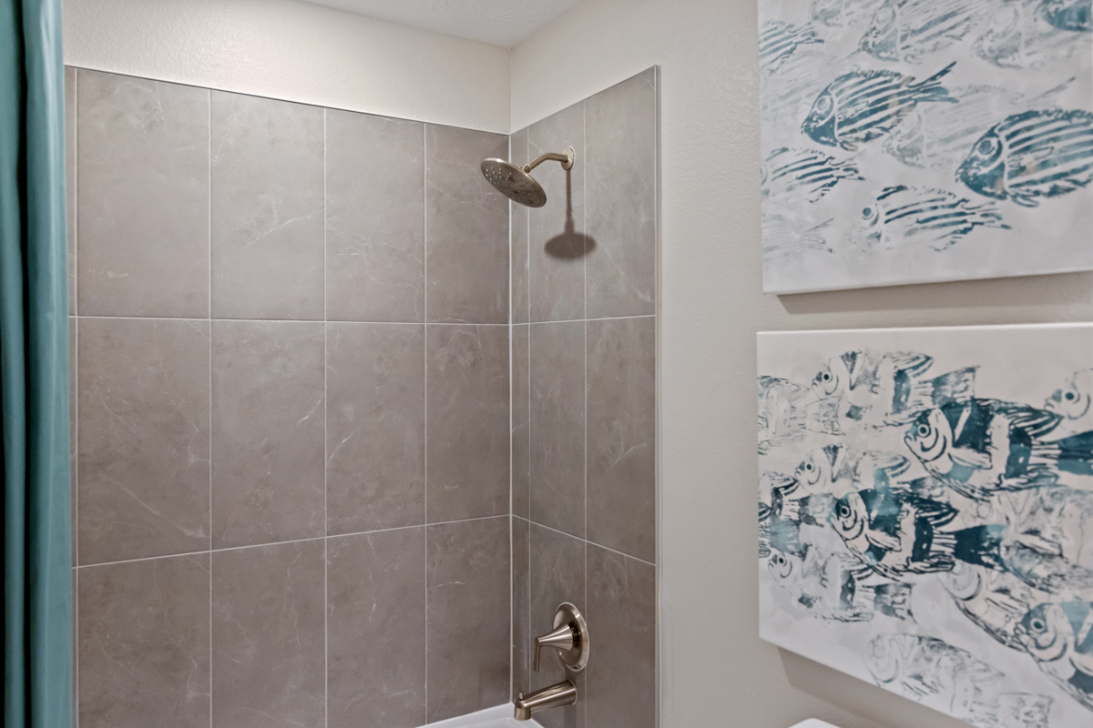 Tub/shower combination with tile surround at bath 2