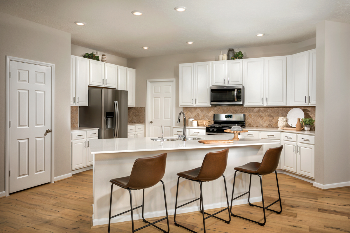 New Homes in Missouri City , TX - Olympia Falls Plan 2526 Kitchen as modeled at Mustang Ridge