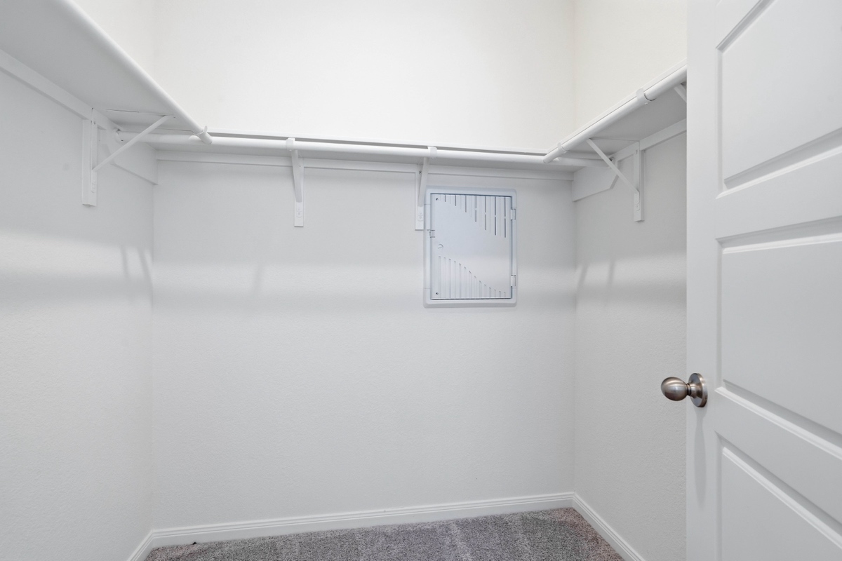 Primary walk-in closet
