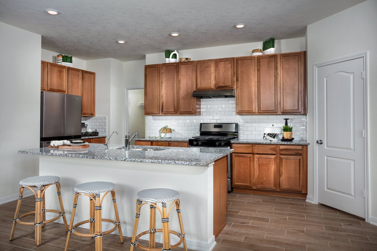 New Homes in Fresno, TX - Olympia Falls Plan 1631 Kitchen 