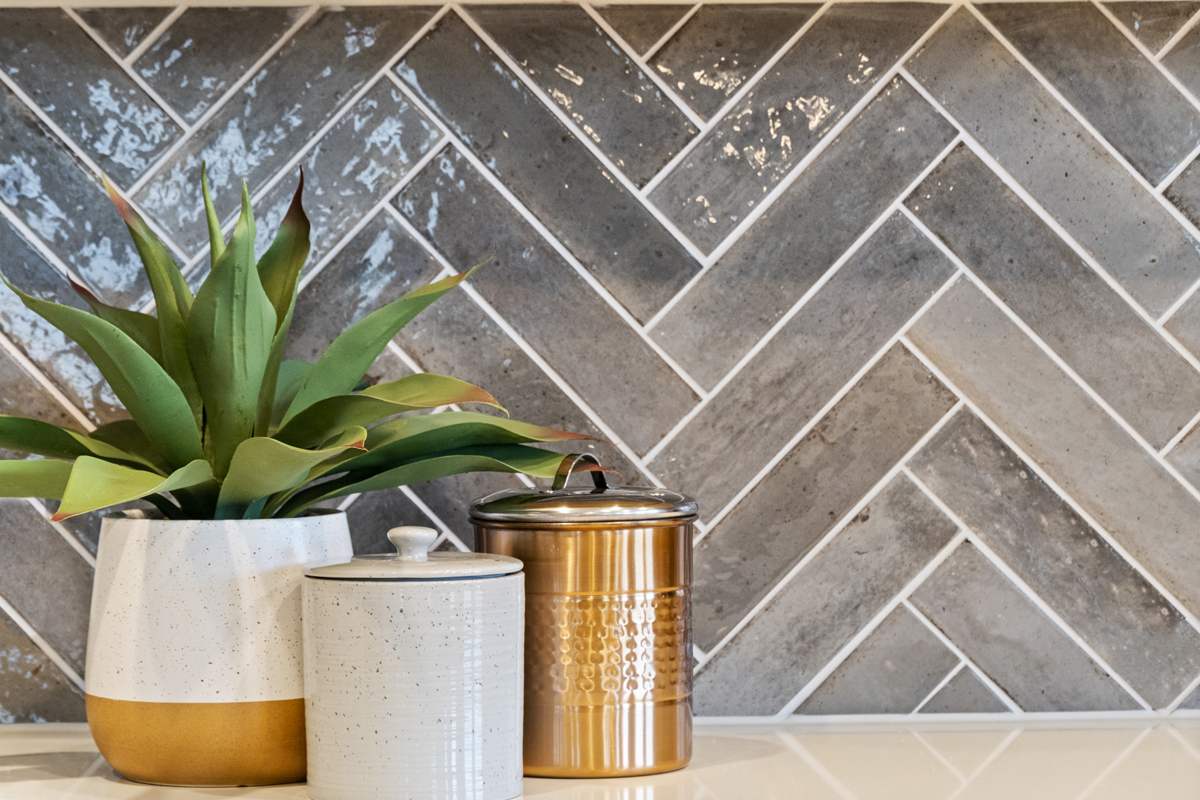 Tile backsplash at kitchen