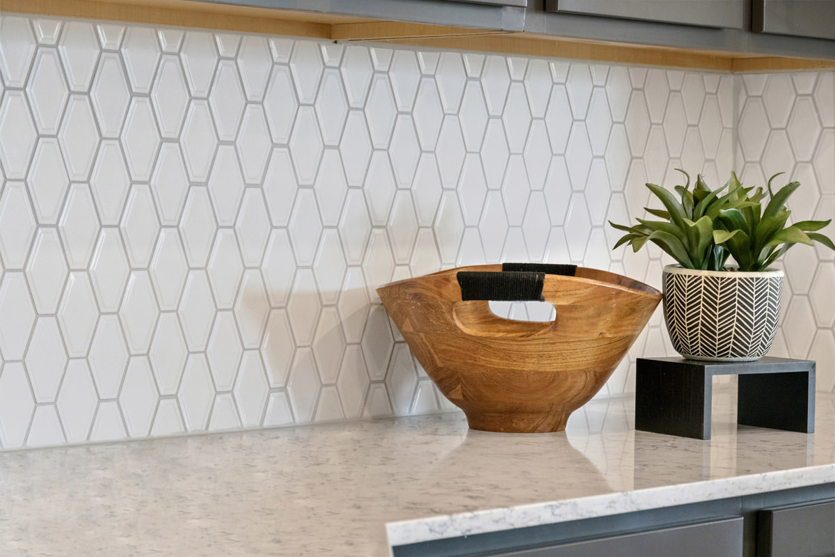 Tile backsplash at kitchen