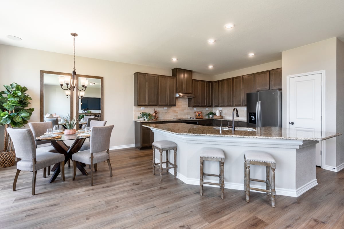 New Homes in New Braunfels, TX - Deer Crest - Classic Collection Plan 2500 Dining Room and Kitchen