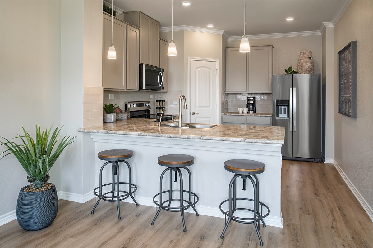 KB model home kitchen in Von Ormy, TX