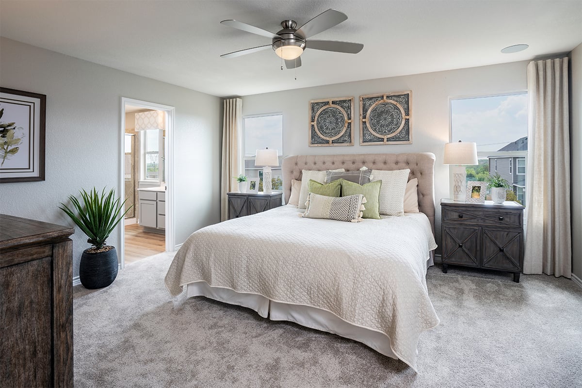 KB model home primary bedroom in Von Ormy, TX