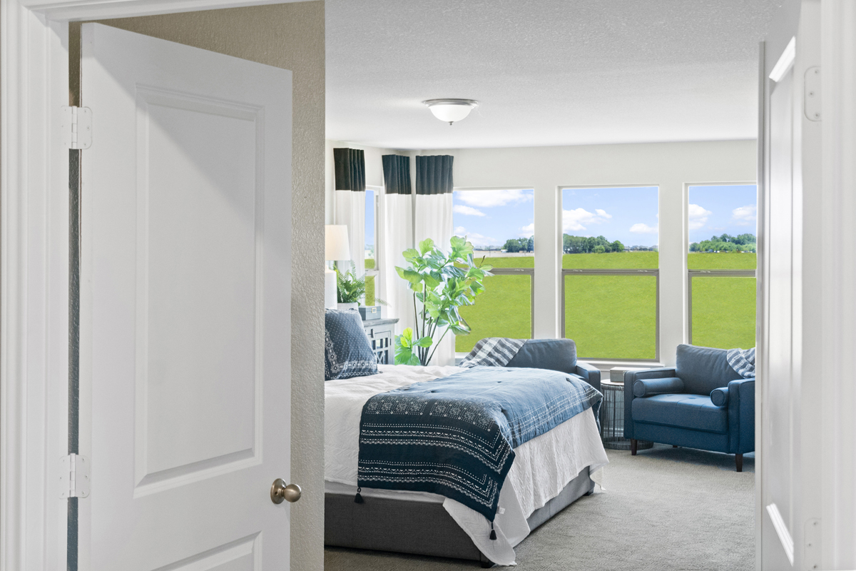 Primary bedroom with double doors