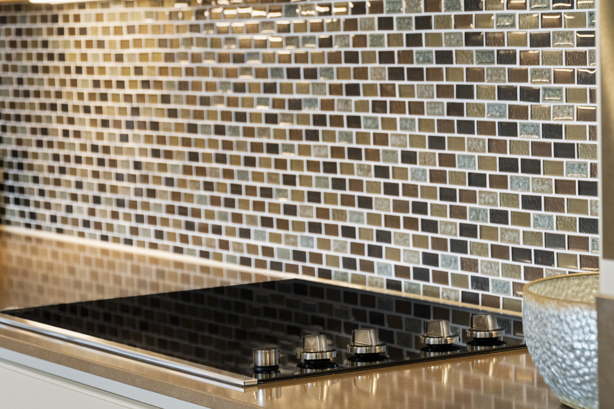 Glass mosaic tile backsplash