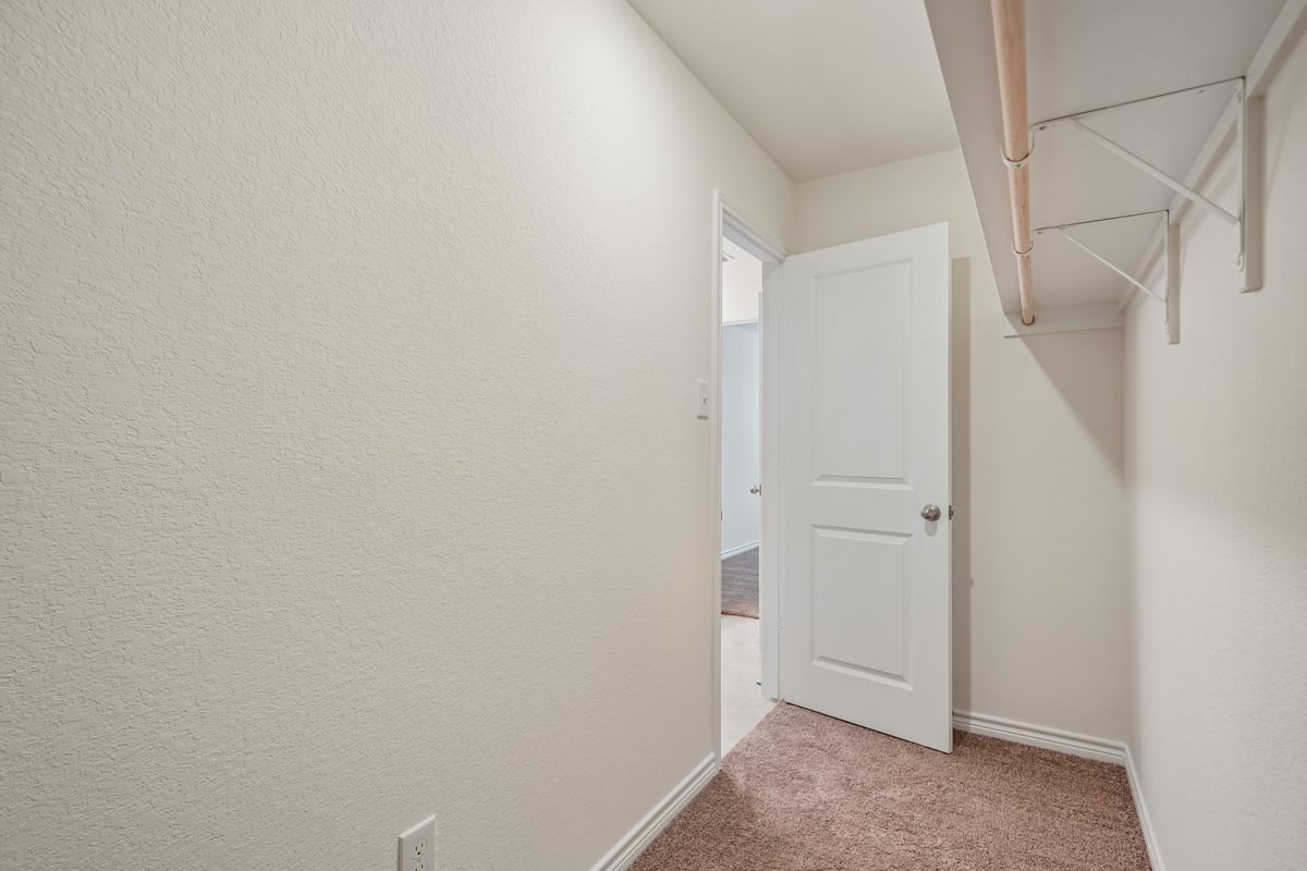 Primary walk-in closet