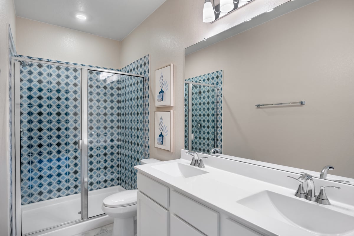 Dual-sink vanity at primary bath