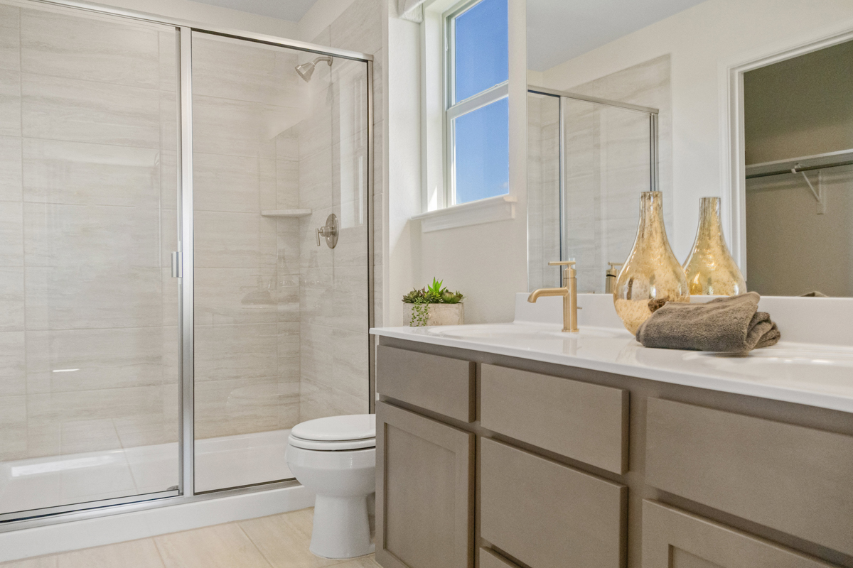 Shower with tile surround at primary bath