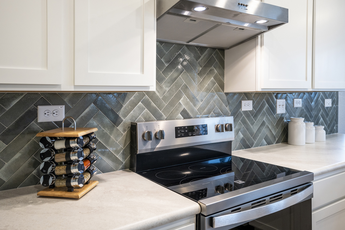 Optional herringbone pattern tile backsplash
