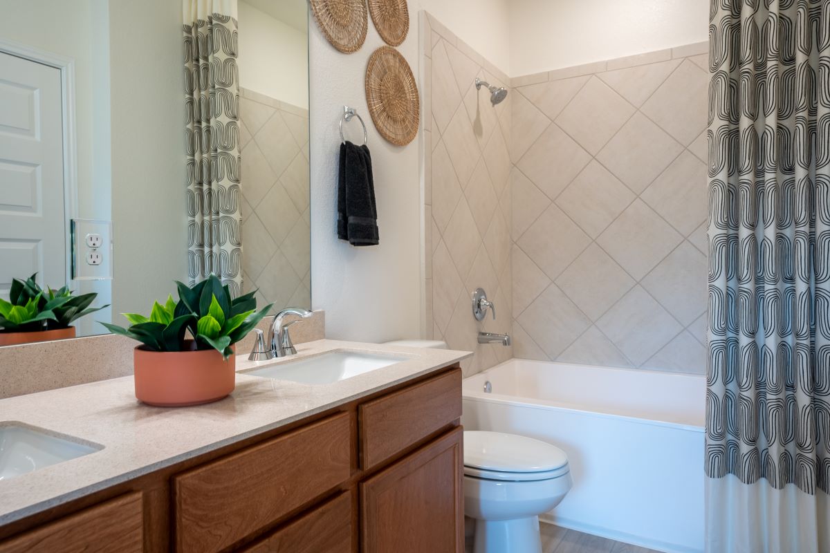 Soaker tub with tile surround at primary bath