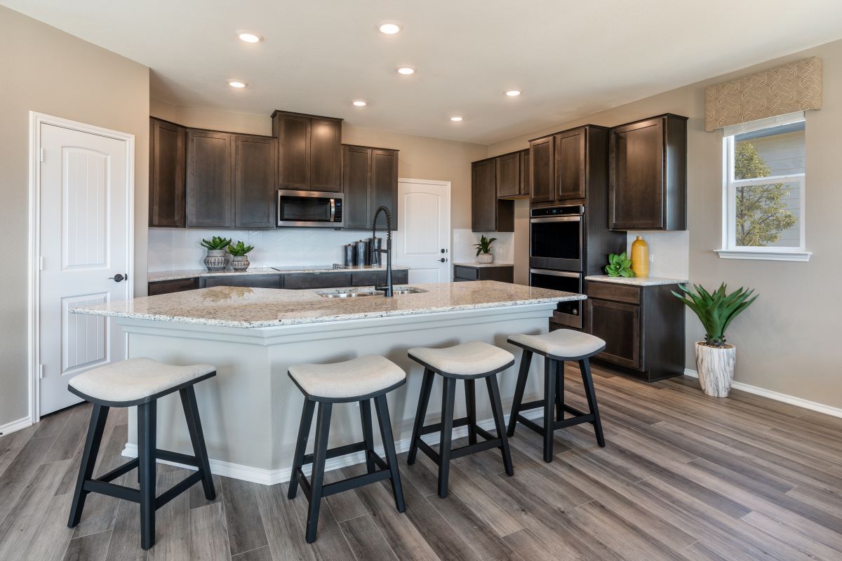 New Homes in Jarrell, TX - Sonterra - Eastwood Plan 2403 Kitchen as modeled at West Canyon Trails